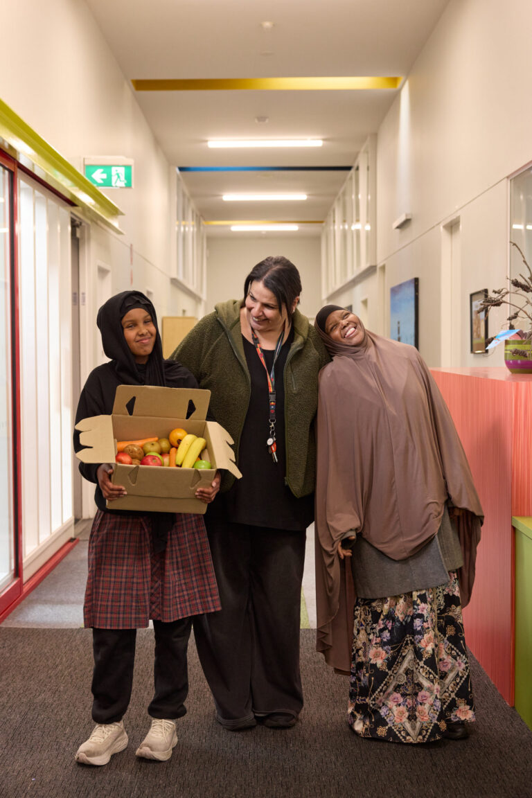 Mother and daughter receiving The One Box