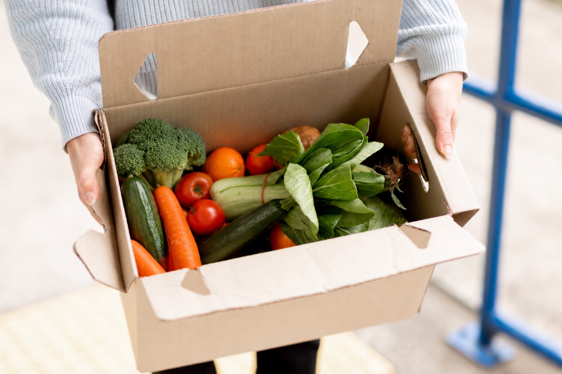 A pre-packed box of fresh fruit and vegetables