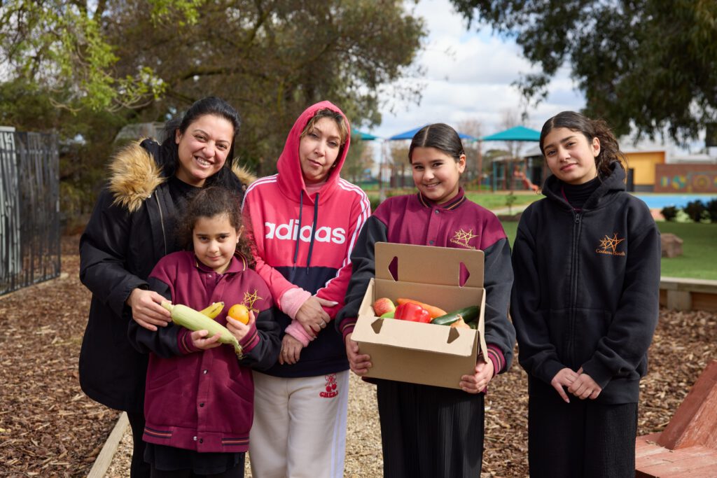 Families with their boxes at school
