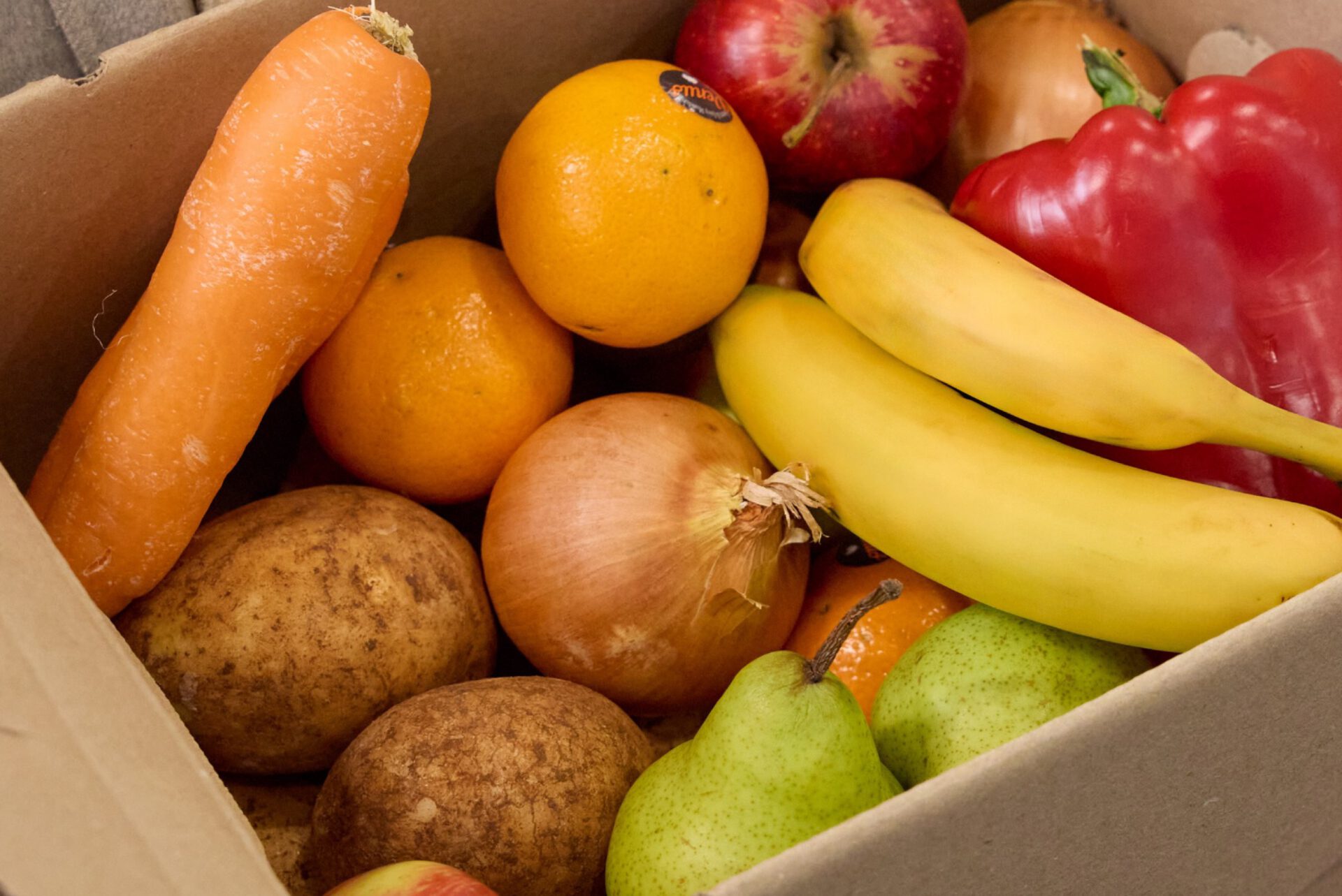 A box of fresh fruit and vegetables